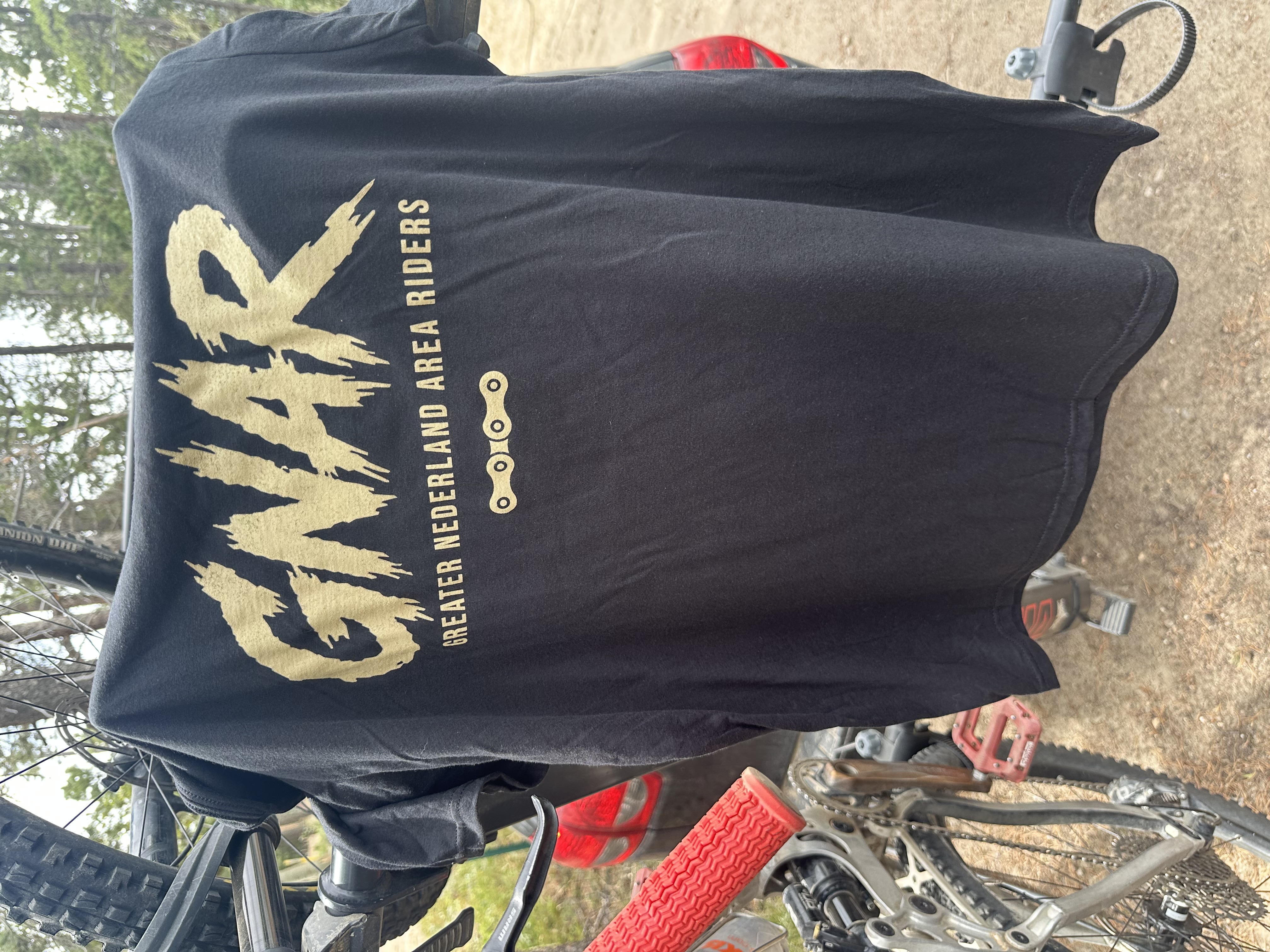 Official GNAR t-shirt with gold brush lettering